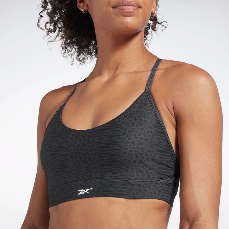 Top deportivo reebok discount mujer